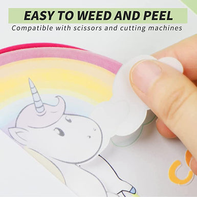 Hand peeling a colorful unicorn sticker from a sheet with text 'Easy to Weed and Peel' and 'Compatible with scissors and cutting machines'.