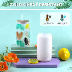 Colorful tumbler with a tropical leaf design on a light blue background with temperature indicators.