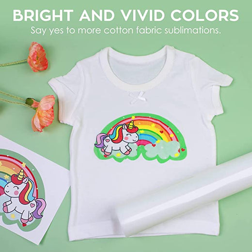 White t-shirt with unicorn and rainbow design on a green background