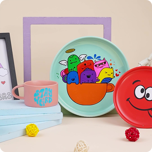 Colorful children's plates with cartoon designs on a light background